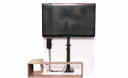 Thumbnail of An piece of furniture with panels removed demonstrating how a TV lift is positioned in a cabinet