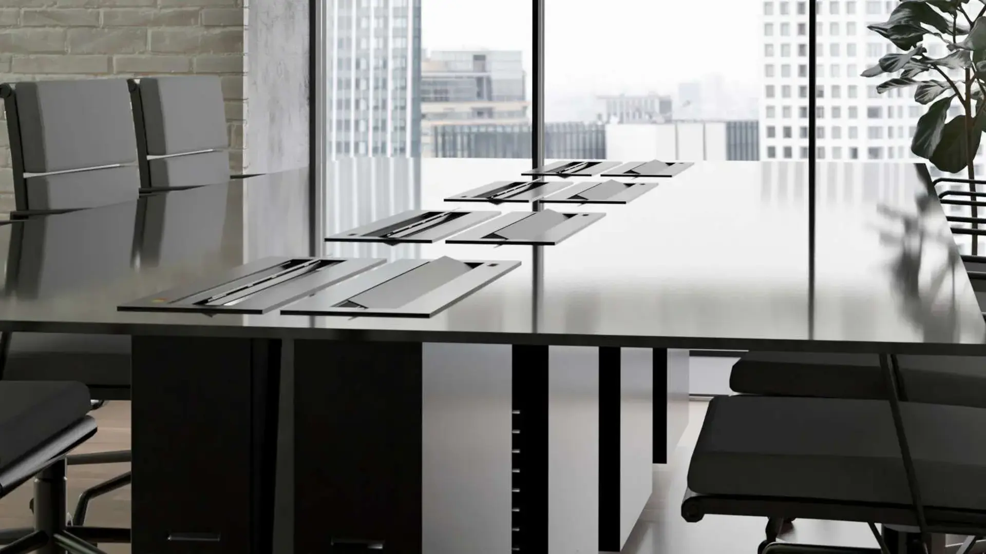 Monitor Lifts installed in a conference desk